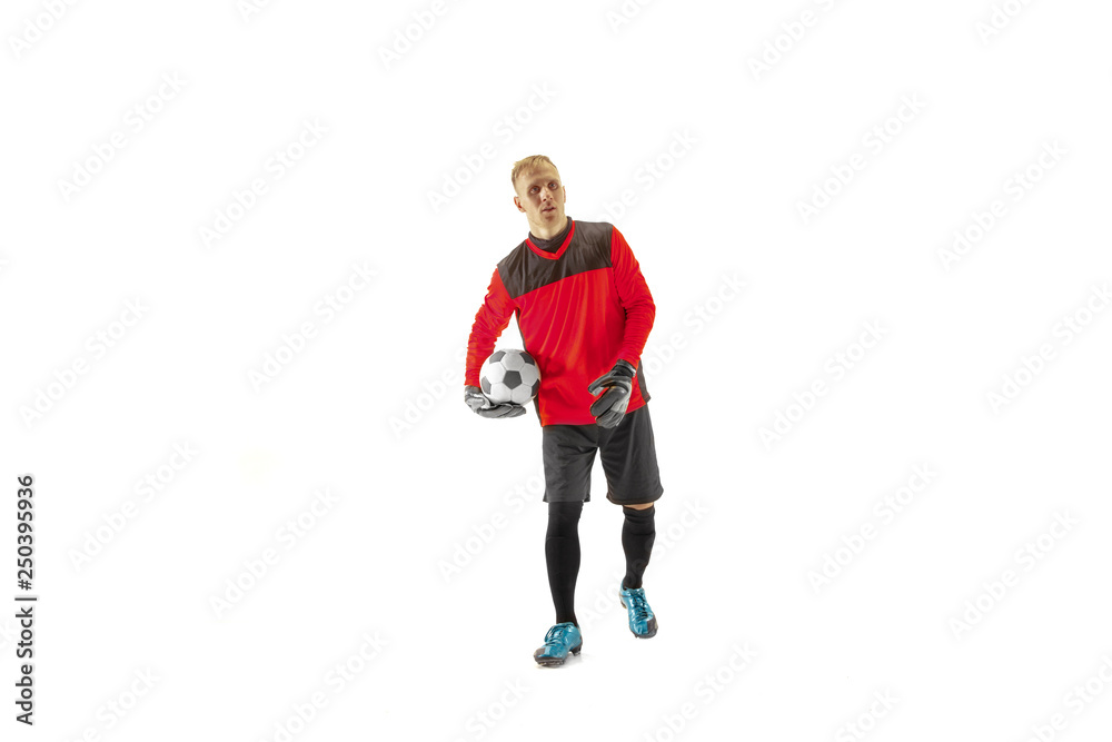 One male soccer player goalkeeper standing and holding ball. Silhouette isolated on white studio background One male soccer player goalkeeper standing and holding ball. Silhouette isolated on white studio background