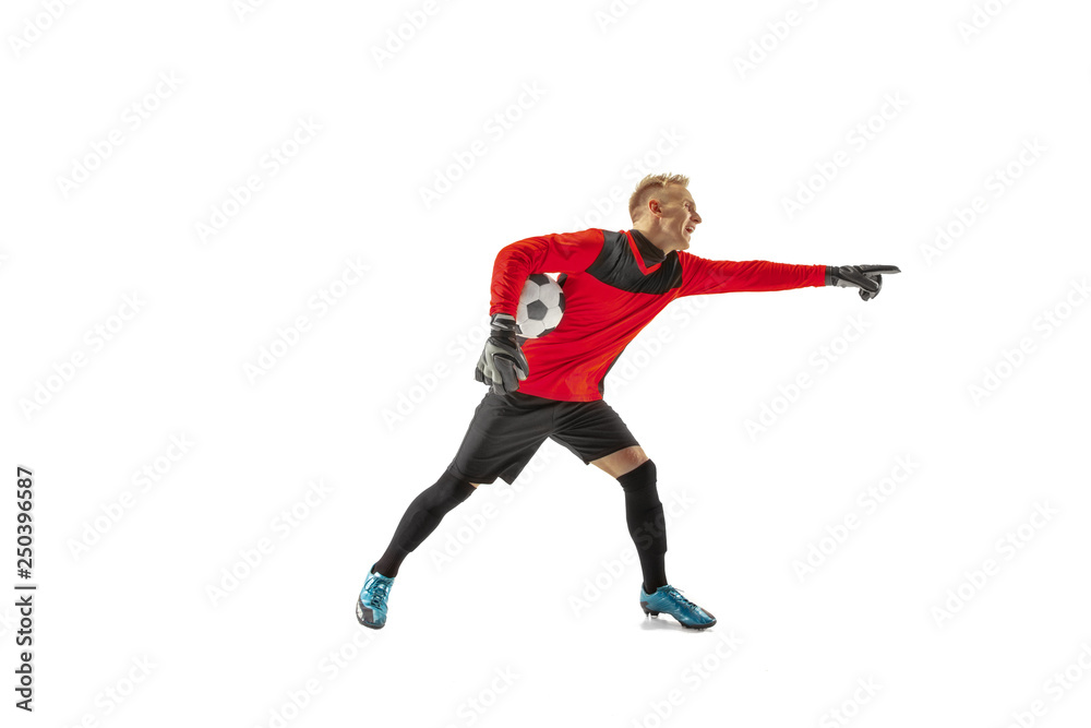 One male soccer player goalkeeper pointing away and screaming isolated on white background. Appeal to the referee, order to defenders and human emotions concept