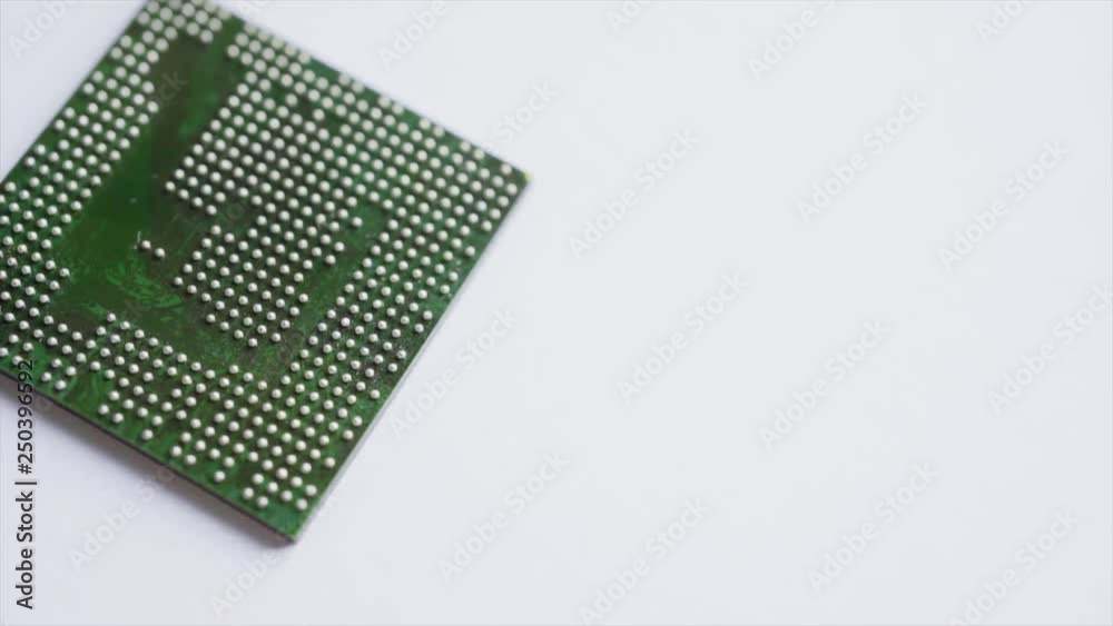 Macro Close-up BGA IC ball rotating view on white Macro Close-up BGA IC ball rotating view on white