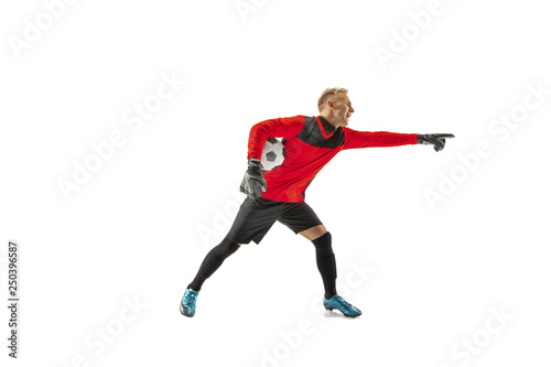 One male soccer player goalkeeper pointing away and screaming isolated on white background. Appeal to the referee, order to defenders and human emotions concept © master1305