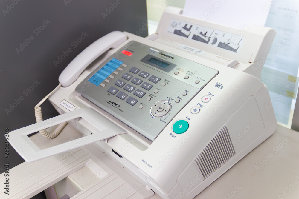 The fax machine for Sending documents in the office concept equipment  needed in office Photos | Adobe Stock