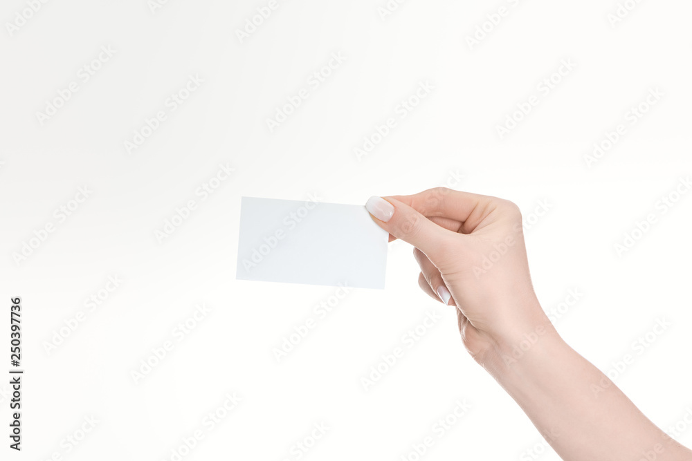 partial view of woman holding empty card isolated on white partial view of woman holding empty card isolated on white