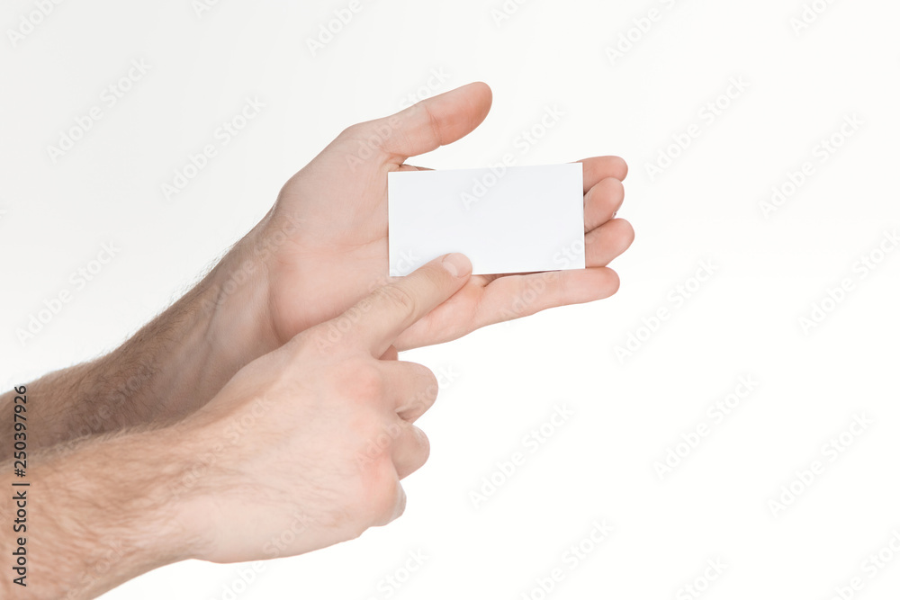 cropped view of man holding blank and empty card isolated on white cropped view of man holding blank and empty card isolated on white