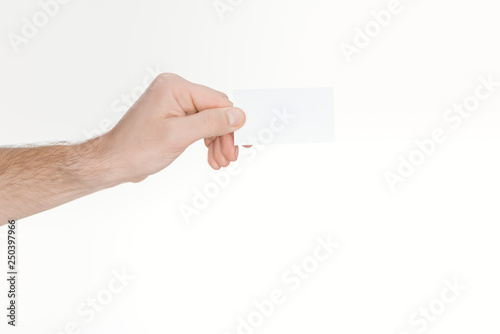 cropped view of man holding blank and empty card with copy space
