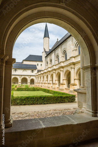 Courtyard and arch in Fontevraud abbey in Loire valley