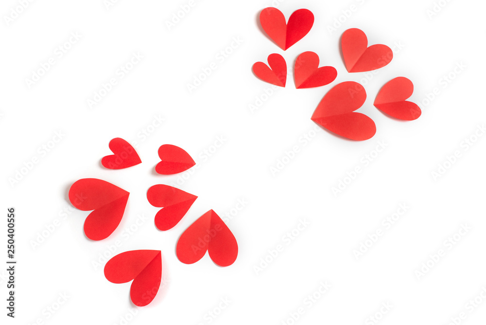 Red paper hearts on white background concept of Valentine's day Red paper hearts on white background concept of Valentine's day