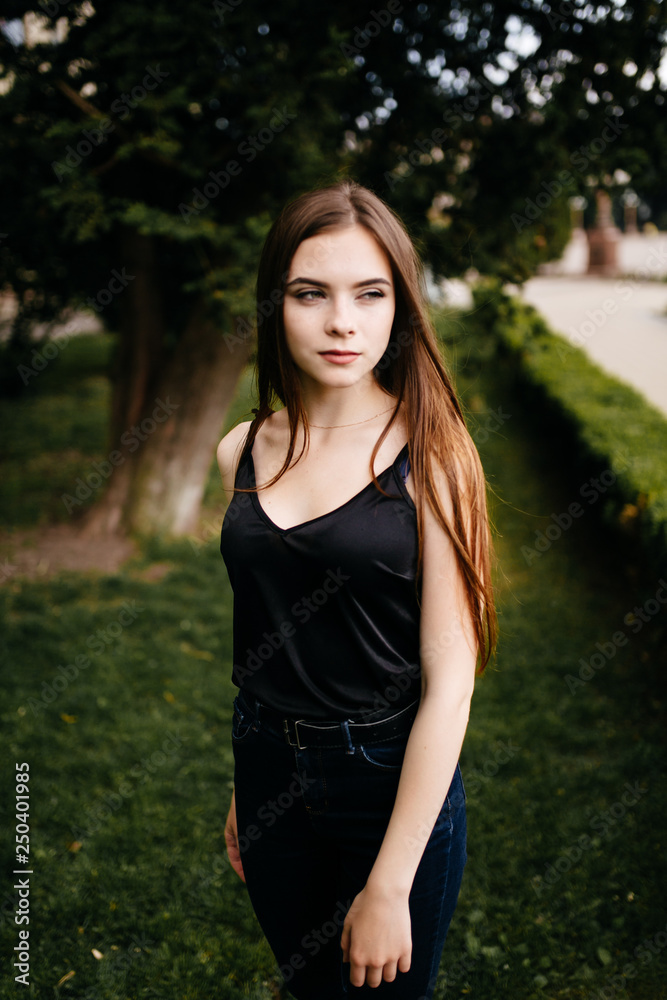 young girl posing on a street in the city young girl posing on a street in the city