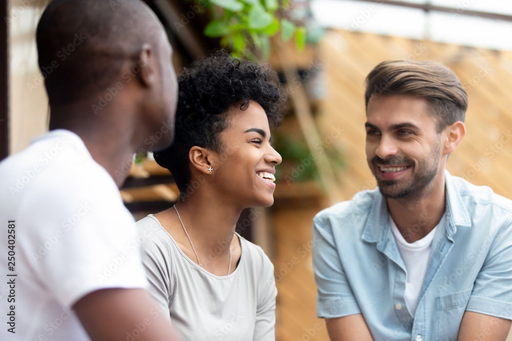 Mixed race female spending time with male friends Mixed race female spending time with male friends