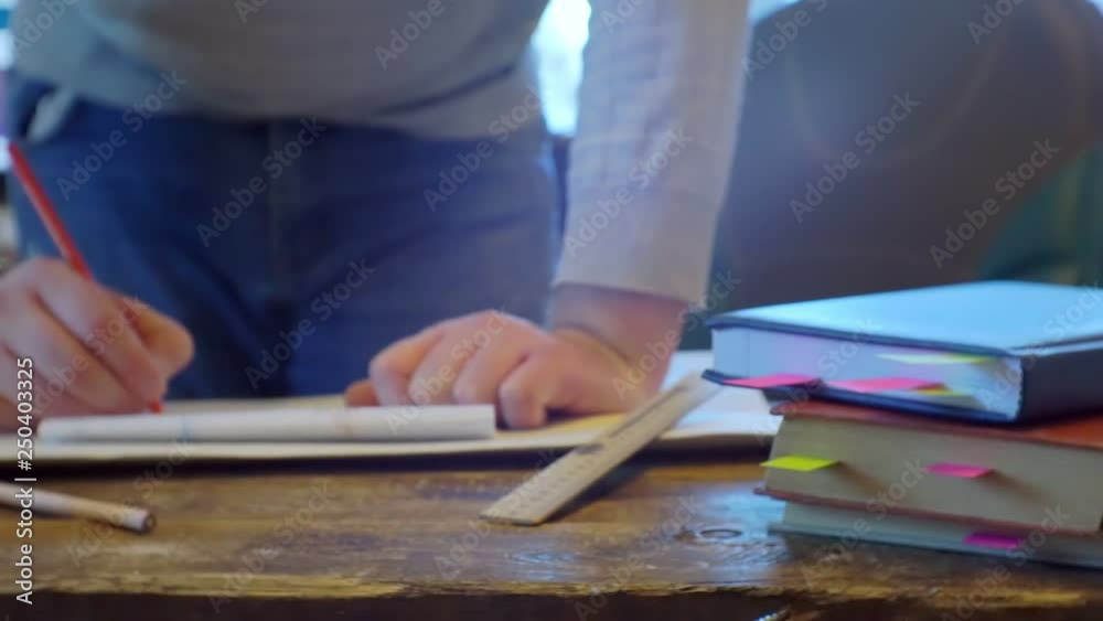 man works at a desk with documents.blurred video.screen saver on business topics. man works at a desk with documents.blurred video.screen saver on business topics.