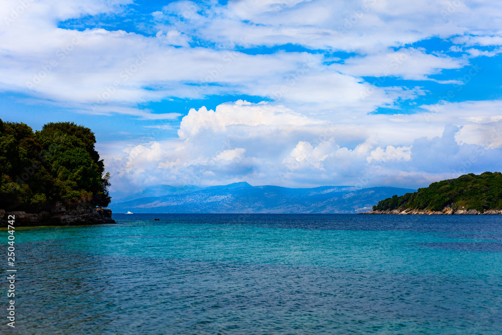 Beautiful scenic with blue sky and sea with islands by the side. Holiday concept image with sea and sky