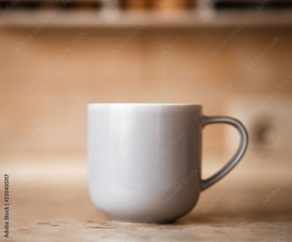 Gray mug on kitchen work surface Gray mug on kitchen work surface