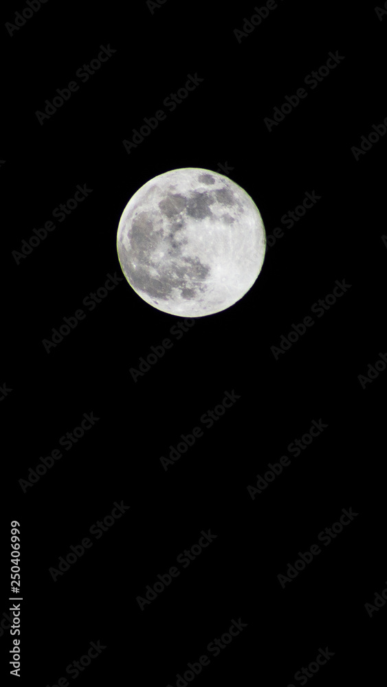 Obraz premium Full moon in the black sky.