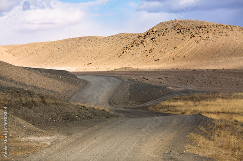 Country road through the steppe of Western Mongolia.