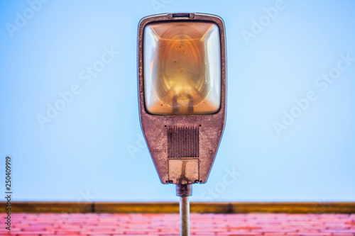 Street light at daylight with blue sky in the background. Electricity and energy concept with street light lamp