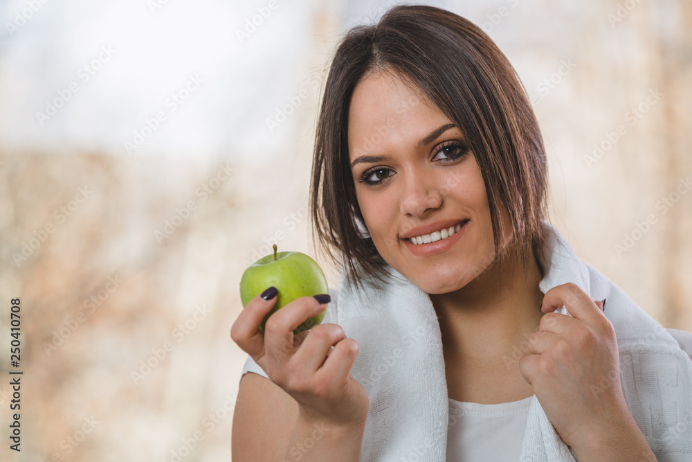 portrait of woman holding apple portrait of woman holding apple
