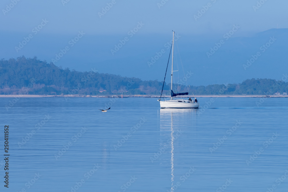 morning seascape with sailing yacht