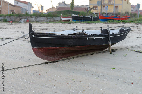 wooden fishing boat dries ashore © sergiy1975