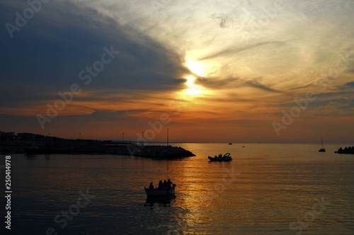 Sunset on the sea of ​​Giovanizza, a small town in southern Italy