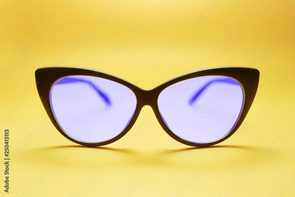 kitty glasses on a yellow background