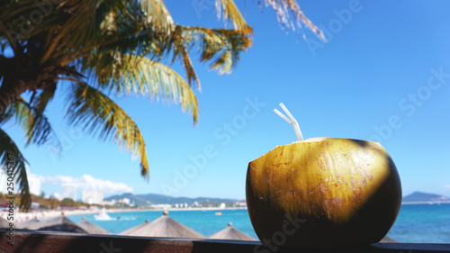 Coconut water drink on a tropical beach