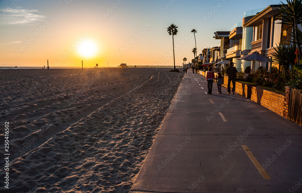 Walking pedestriam and cycle path on Newport beach in southern California
