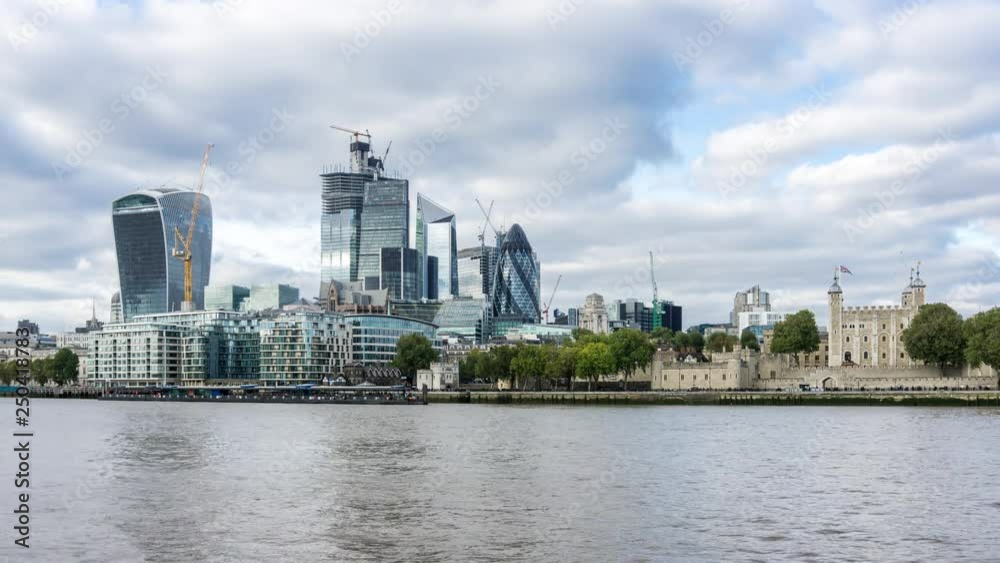 North bank of the River Thames, The Tower of London and The City skyscrapers, day time, timelapse. North bank of the River Thames, The Tower of London and The City skyscrapers, day time, timelapse.