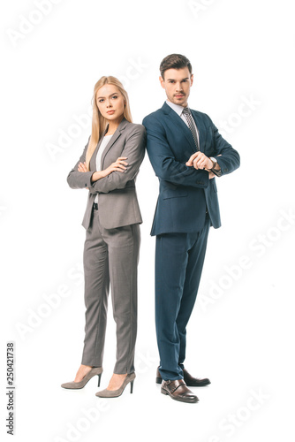 confident businesswoman and businessman posing with crossed arms isolated on white