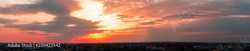 An panorama photography of a sunset over the munich city