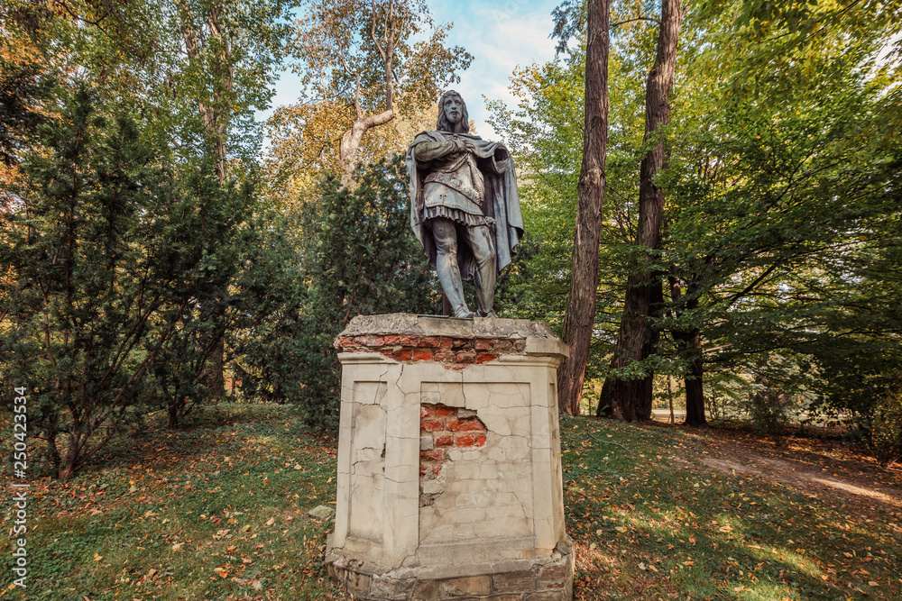 Obraz premium Lancut castle. Statue in Park surrounding the castle