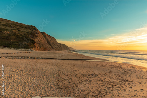 Beach of the magoito in Portugal at sunset