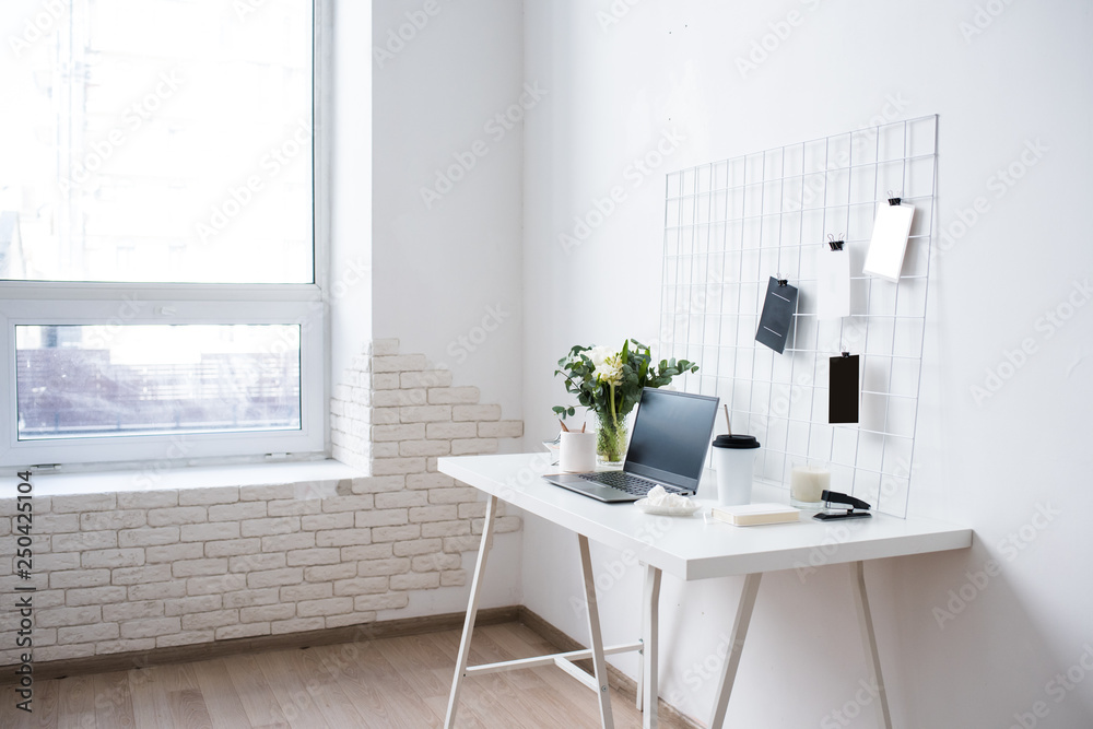 Fototapeta premium Stylish white professional office interior, minimalist loft workspace