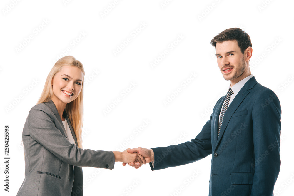 smiling successful businesspeople shaking hands isolated on white
