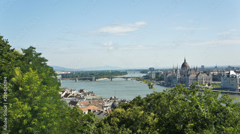 Aerial view of the Danube river and the Hungarian Parliament on the bank in Budapest, sunny day, Hungary