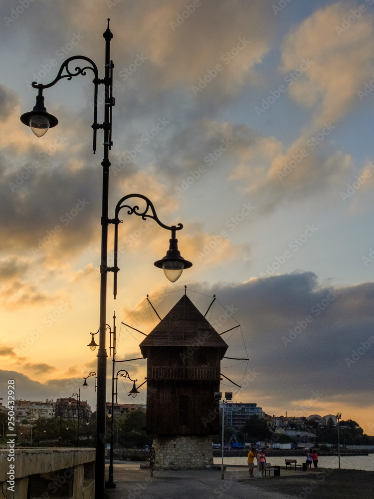 Obraz premium old street lamp on the background of blue sky in Nessebar