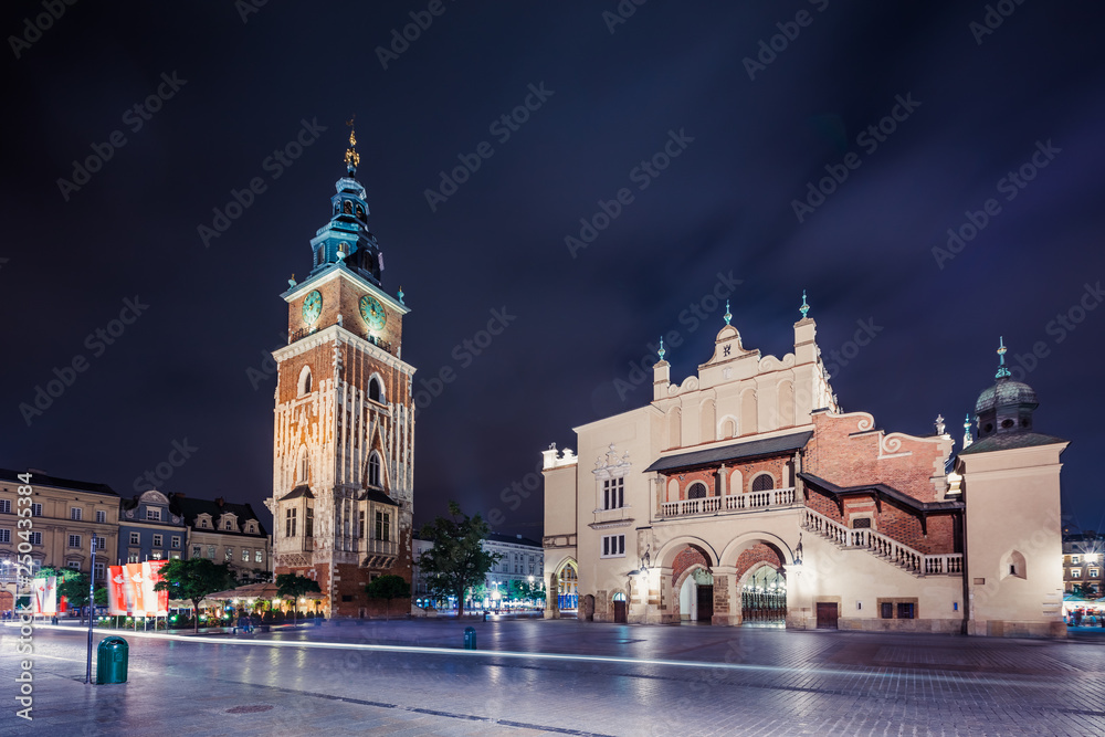 Krakow Cloth Hall and Town Hall Tower at night , Poland