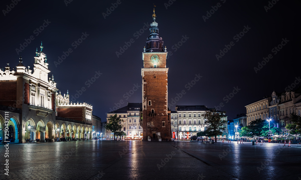 Krakow Cloth Hall and Town Hall Tower at night , Poland