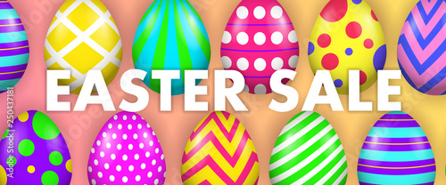 Easter Sale lettering with bright painted eggs. Easter sale advertising design. Typed text, calligraphy. For posters, invitations, banners, leaflets and brochures. photo