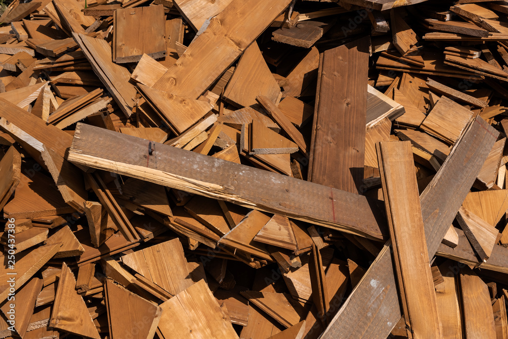 Heap of old building wood, pile of old wooden boards.