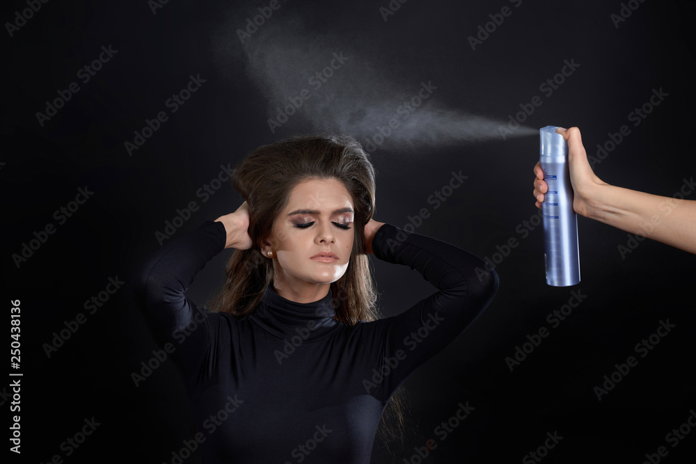 Portrait of a girl in a studio on a black background. Portrait of a girl in a studio on a black background.