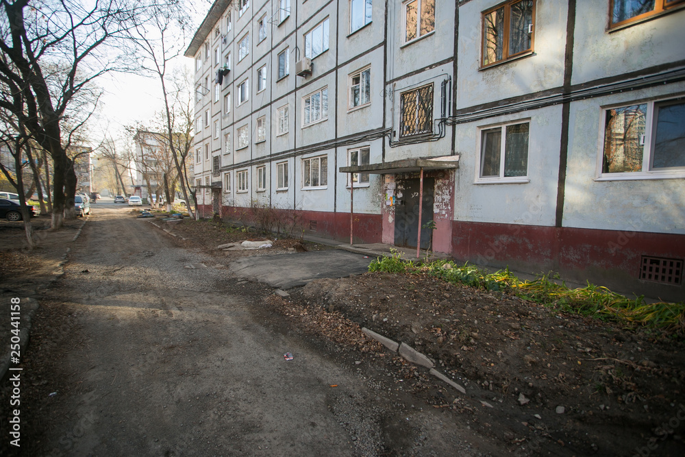 Obraz premium Residential development of Vladivostok panel and brick houses. Streets of sleeping areas of the capital of the Far East