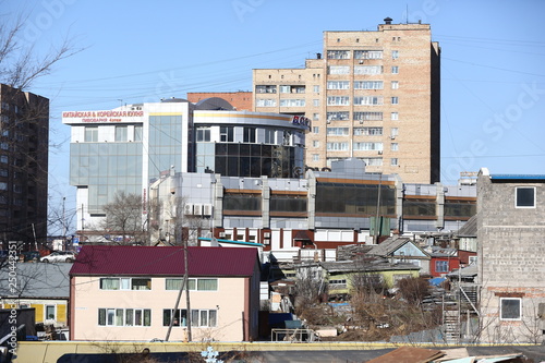 Residential development of Vladivostok panel and brick houses. Streets of sleeping areas of the capital of the Far East photo