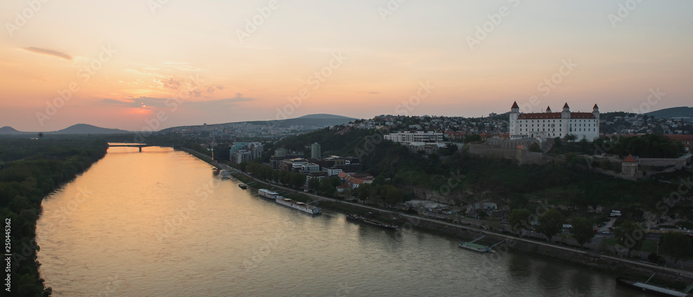 Beautiful panorama of  Bratislava Downtown.View of river during the sunset.Cityscape at twilight.Traveling concept background.The landscape of the old historical city.Slovakia, Europe