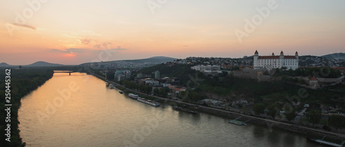 Beautiful panorama of  Bratislava Downtown.View of river during the sunset.Cityscape at twilight.Traveling concept background.The landscape of the old historical city.Slovakia, Europe © mykola