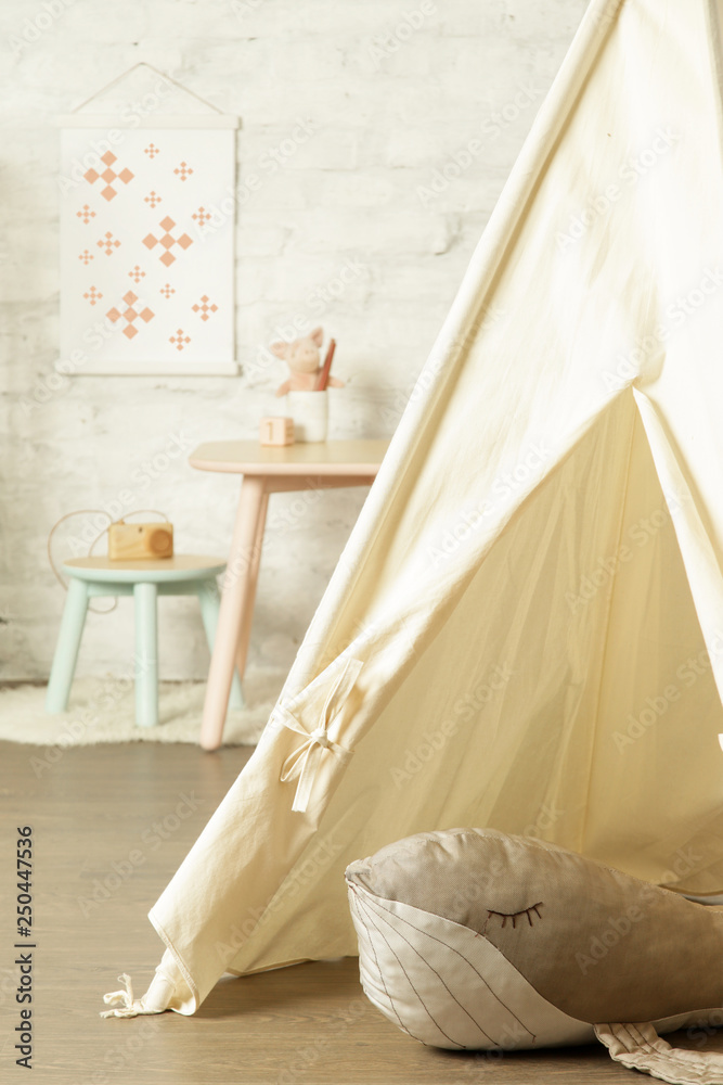 Tent, crib and kids furniture in the nursery room, nicely decorated kids room Tent, crib and kids furniture in the nursery room, nicely decorated kids room