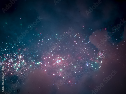 The London New year fireworks display captured from the central Barge on the River Thames