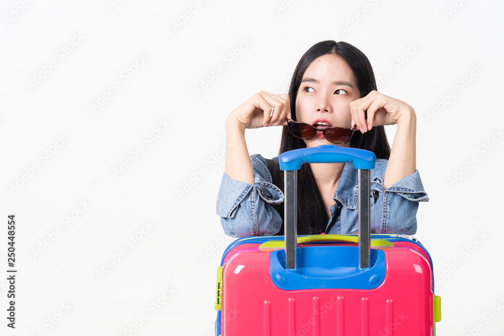 Traveler tourist woman in summer casual clothes.Asian Smiling woman wearing sun glasses.Passenger traveling abroad to travel on white background. Traveler tourist woman in summer casual clothes.Asian Smiling woman wearing sun glasses.Passenger traveling abroad to travel on white background.