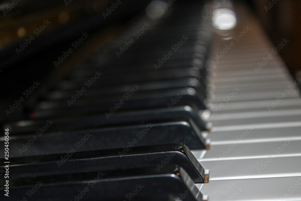 selective focus shot of a piano keyboard selective focus shot of a piano keyboard
