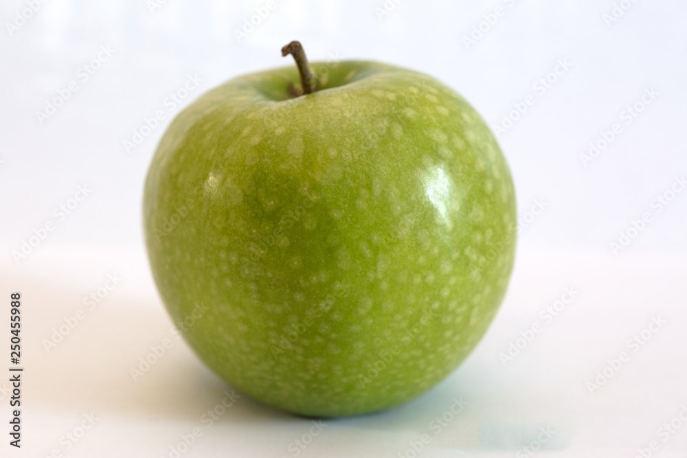 Isolated apple fruit on white background side view