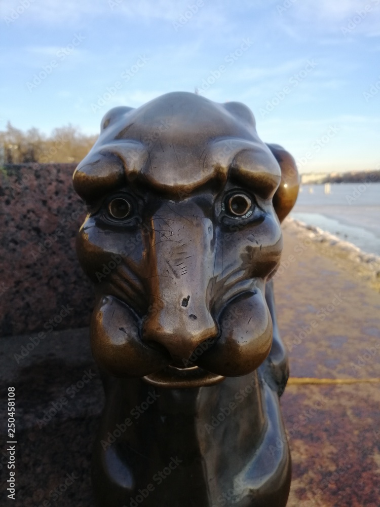 Lion head in metal