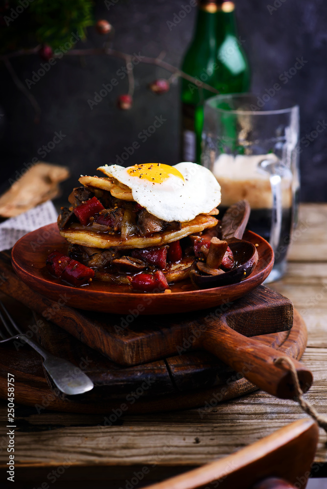 Irish potato pancakes with sausage beer stew.selective focus Irish potato pancakes with sausage beer stew.selective focus